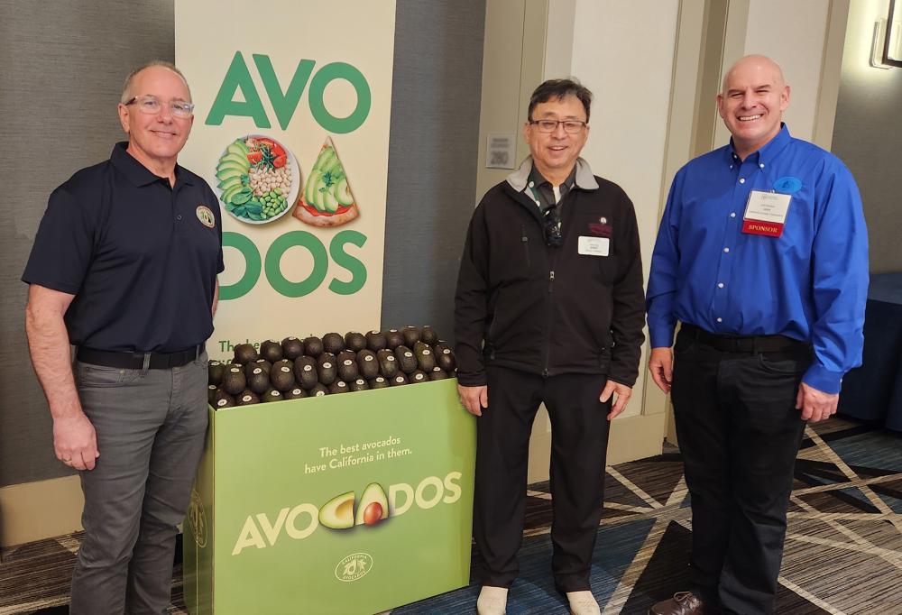 Terry Splane and Jeff Oberman with John Fujii (Gelson’s) in front of the Commission’s display bin.